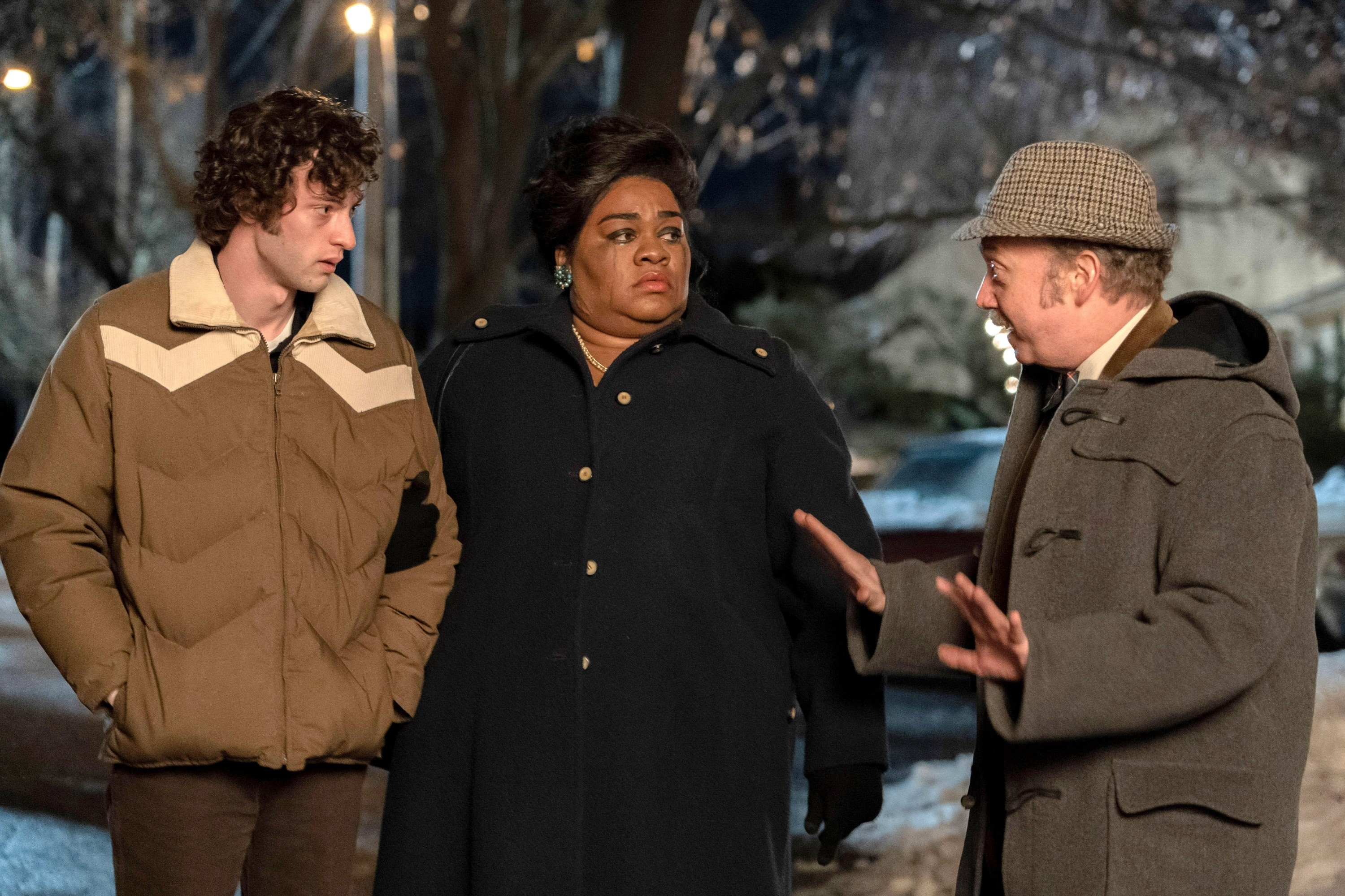 Dominic Sessa, Da&#x27;Vine Joy Randolph, and Paul Giamatti in a winter scene, engaged in conversation, wearing heavy coats