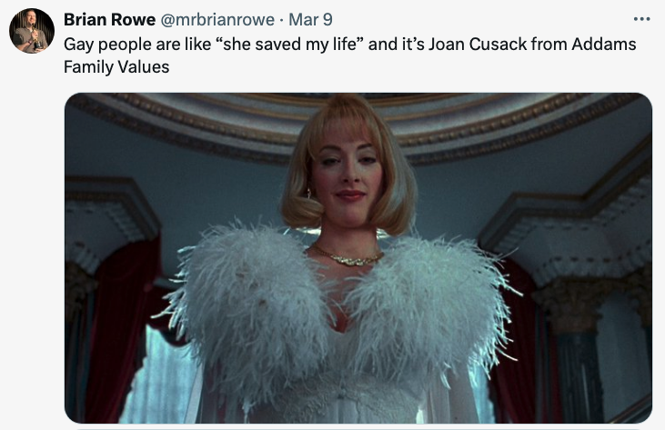 Joan Cusack as Debbie in &quot;Addams Family Values&quot; with a feather trim, caption references her character&#x27;s impact