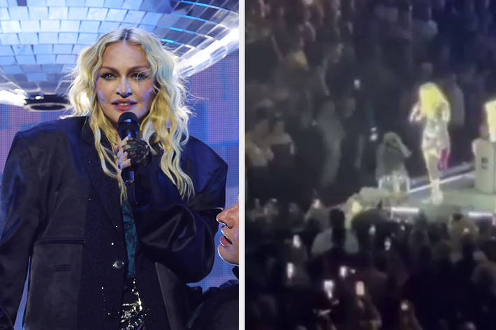 Madonna on stage performing in an oversized jacket; blurry audience in the foreground