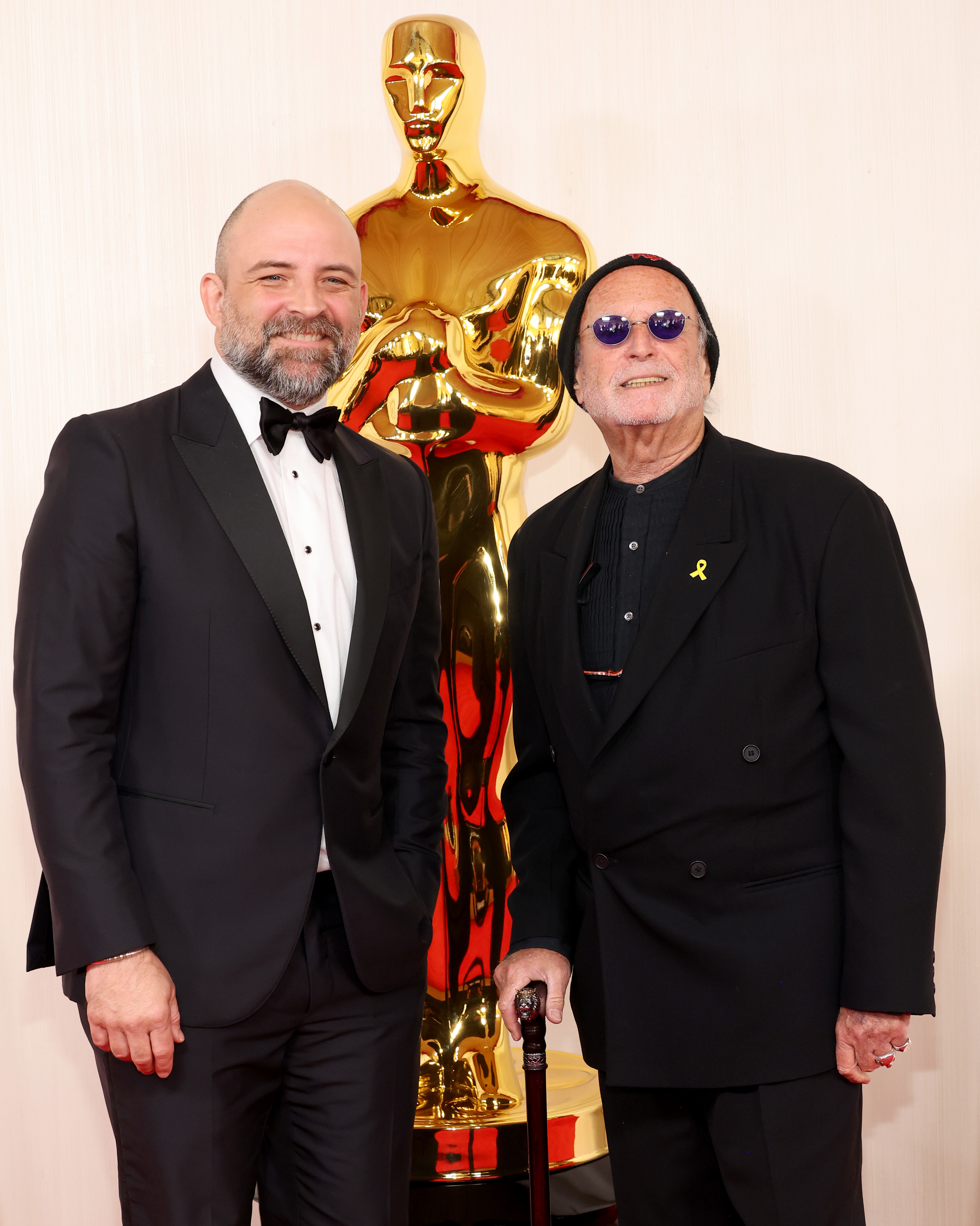 Avi Arad and another gentleman at the Oscars