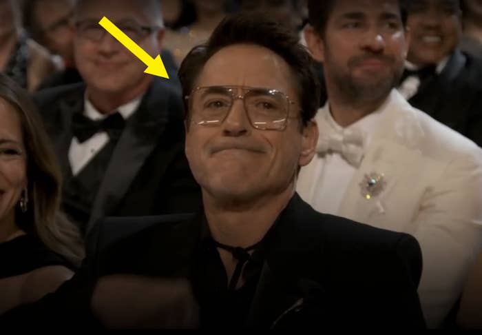 Robert Downey Jr. sitting in an audience