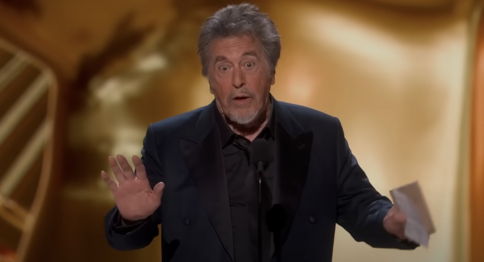 Al Pacino in a classic suit, gesturing