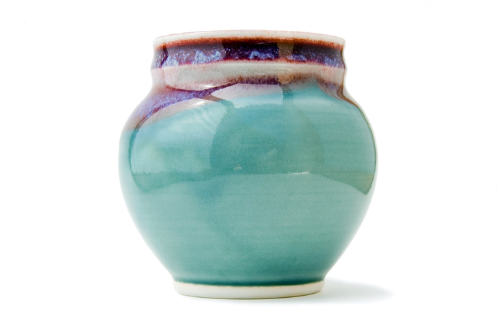 Ceramic vase with two-tone glaze, upper portion in purplish hue transitioning to a bluish-green lower section