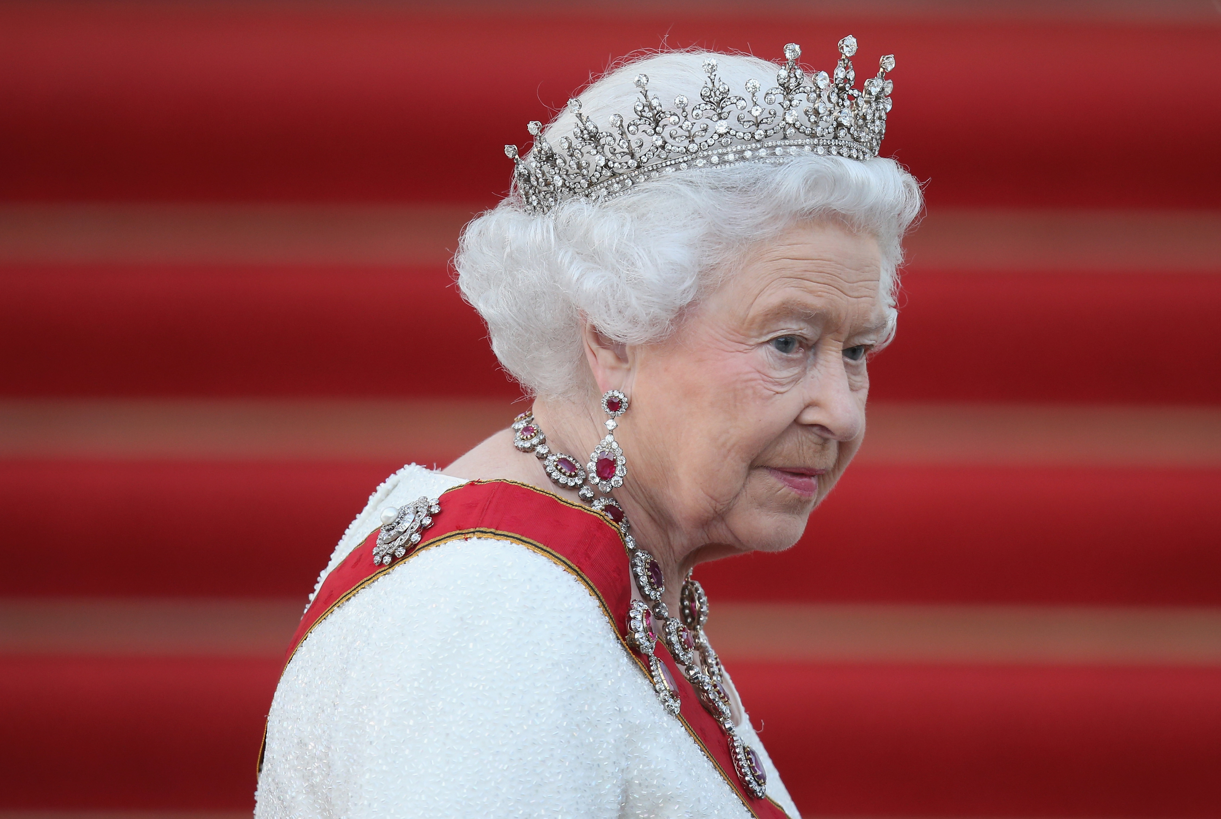 Queen Elizabeth II wearing a tiara and ceremonial robe