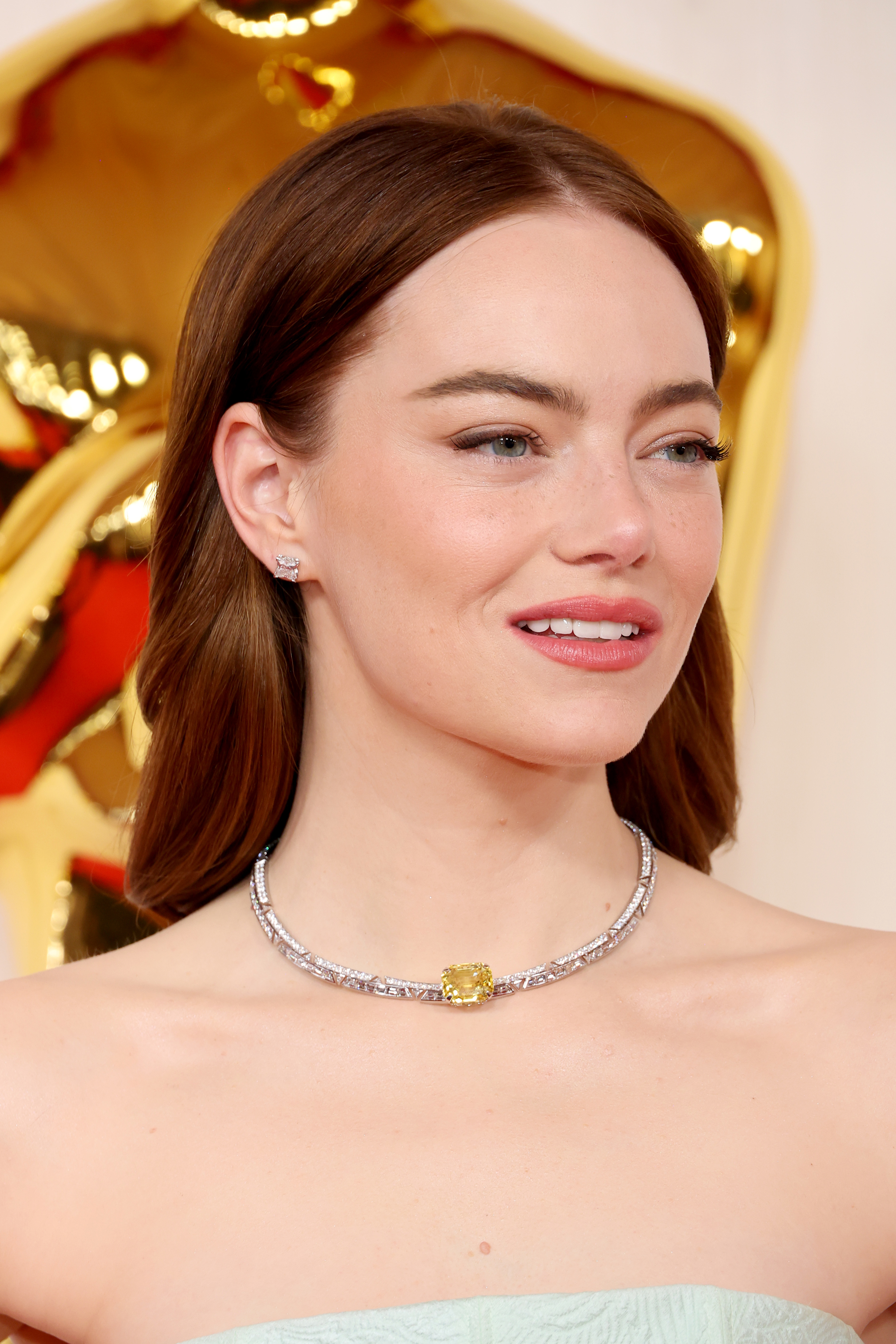 Emma Stone in a bejeweled necklace