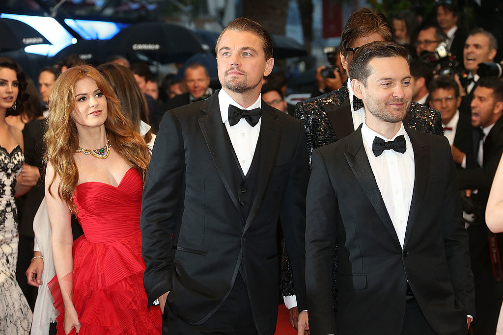Isla Fisher, Leo DiCaprio, and Tobey Maguire on the red carpet