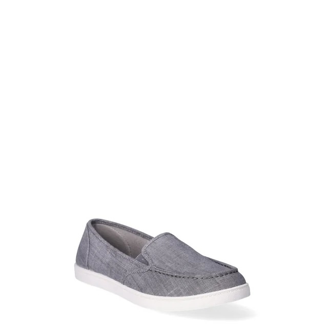 Casual slip-on shoe with a canvas upper and white sole, suitable for everyday wear