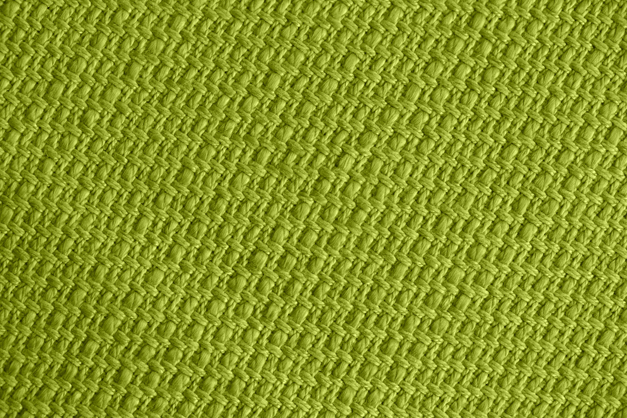 Close-up texture of green woven fabric