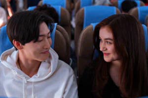 Peter gesturing a peace sign with "Backpacking in Belgium" text overlay