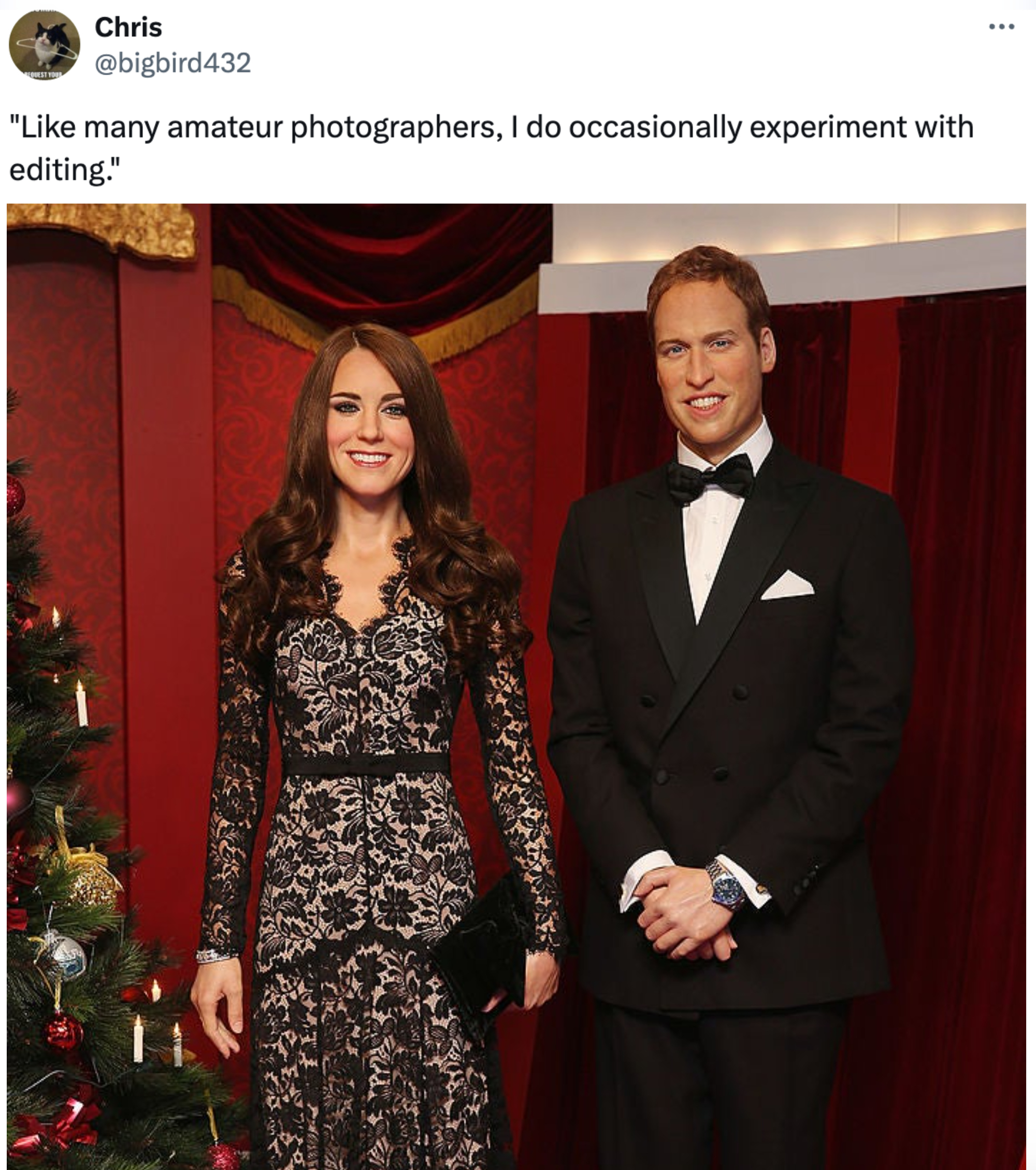 Wax figures resembling Kate Middleton in a lace dress and Prince William in a tuxedo at a museum exhibit next to a Christmas tree
