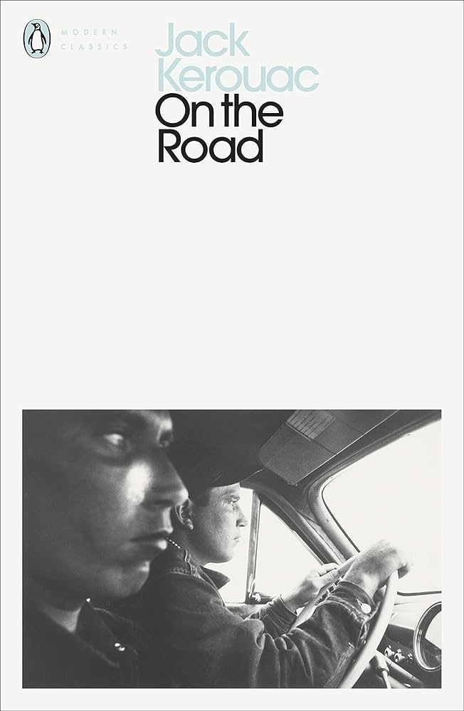 Book cover of &quot;On the Road&quot; by Jack Kerouac featuring two men in a car; one is driving