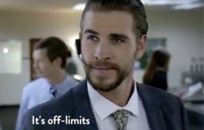 Man in a suit with tie looking forward, subtitle text reads &quot;It&#x27;s off-limits,&quot; office setting in background