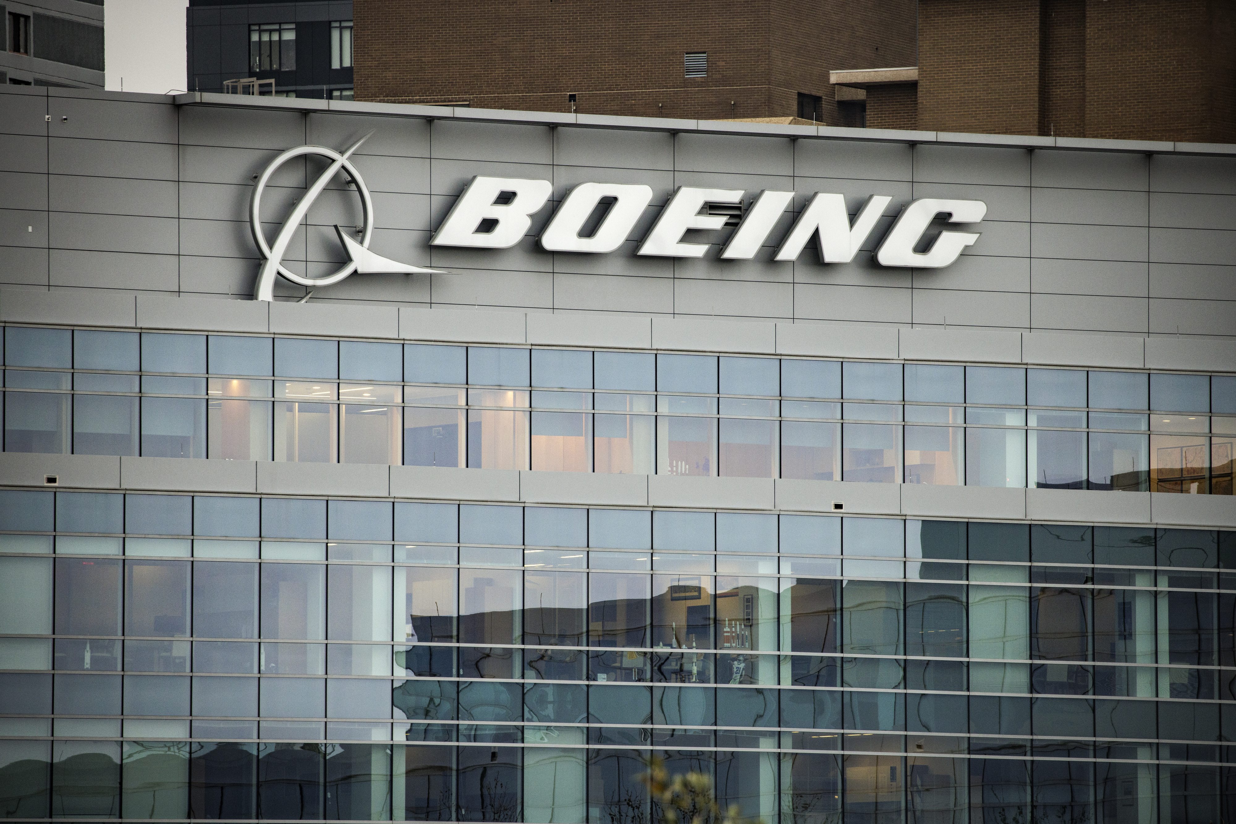 Boeing logo on the exterior of a corporate building with reflective windows