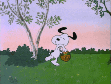 Animated character Snoopy walking with a basket under a tree