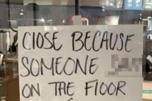 Sign on a store window reads "CLOSE BECAUSE SOMEONE SHIT ON THE FLOOR" with a frowning face drawn below the text