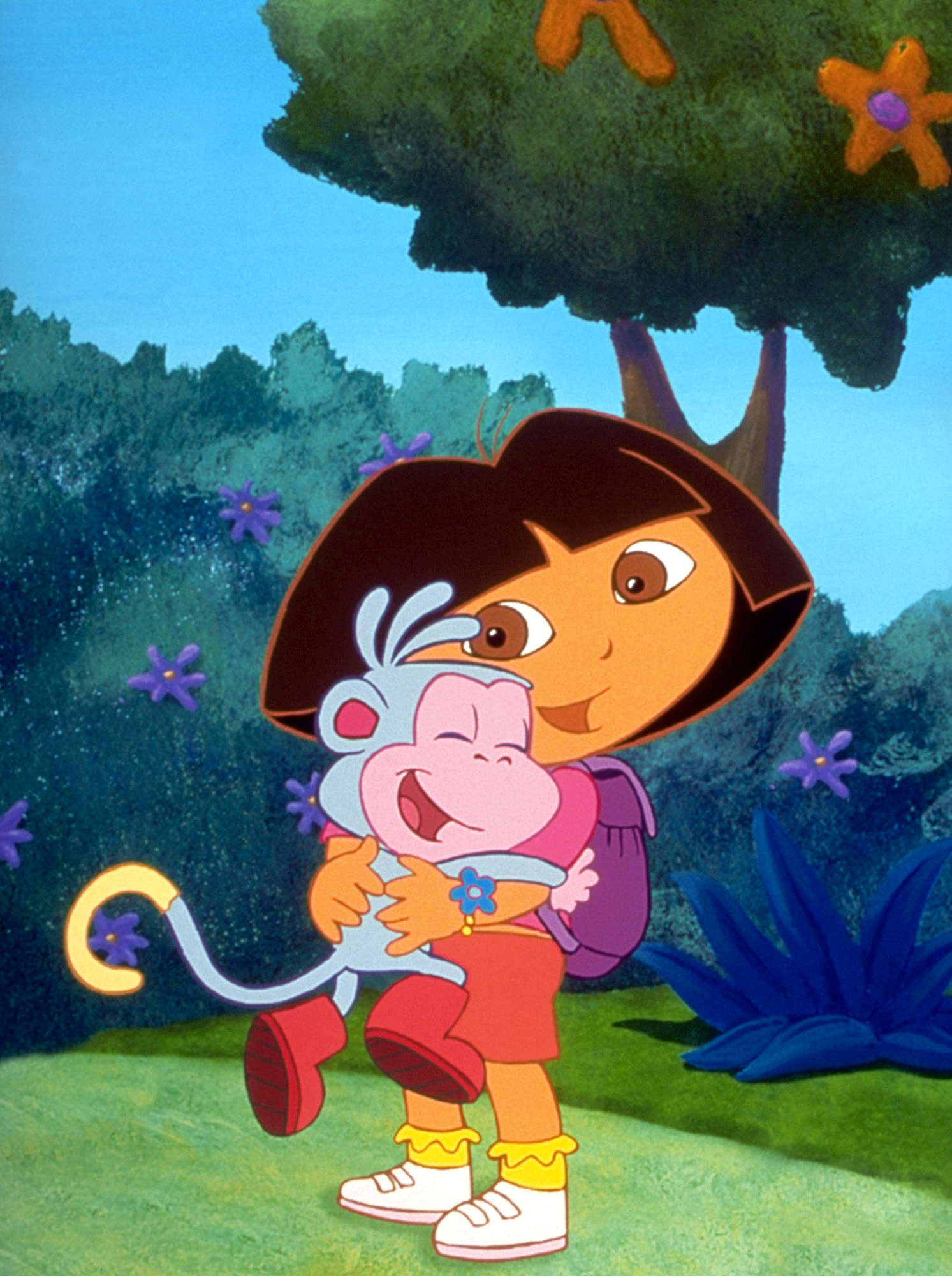 Dora the Explorer holding Boots the Monkey in a forest setting
