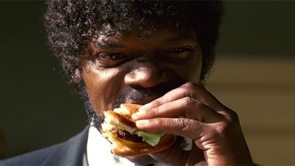 Jules Winnfield from Pulp Fiction biting a burger