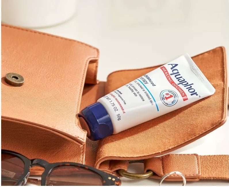 A tube of Aquaphor that can fit inside a purse or bag