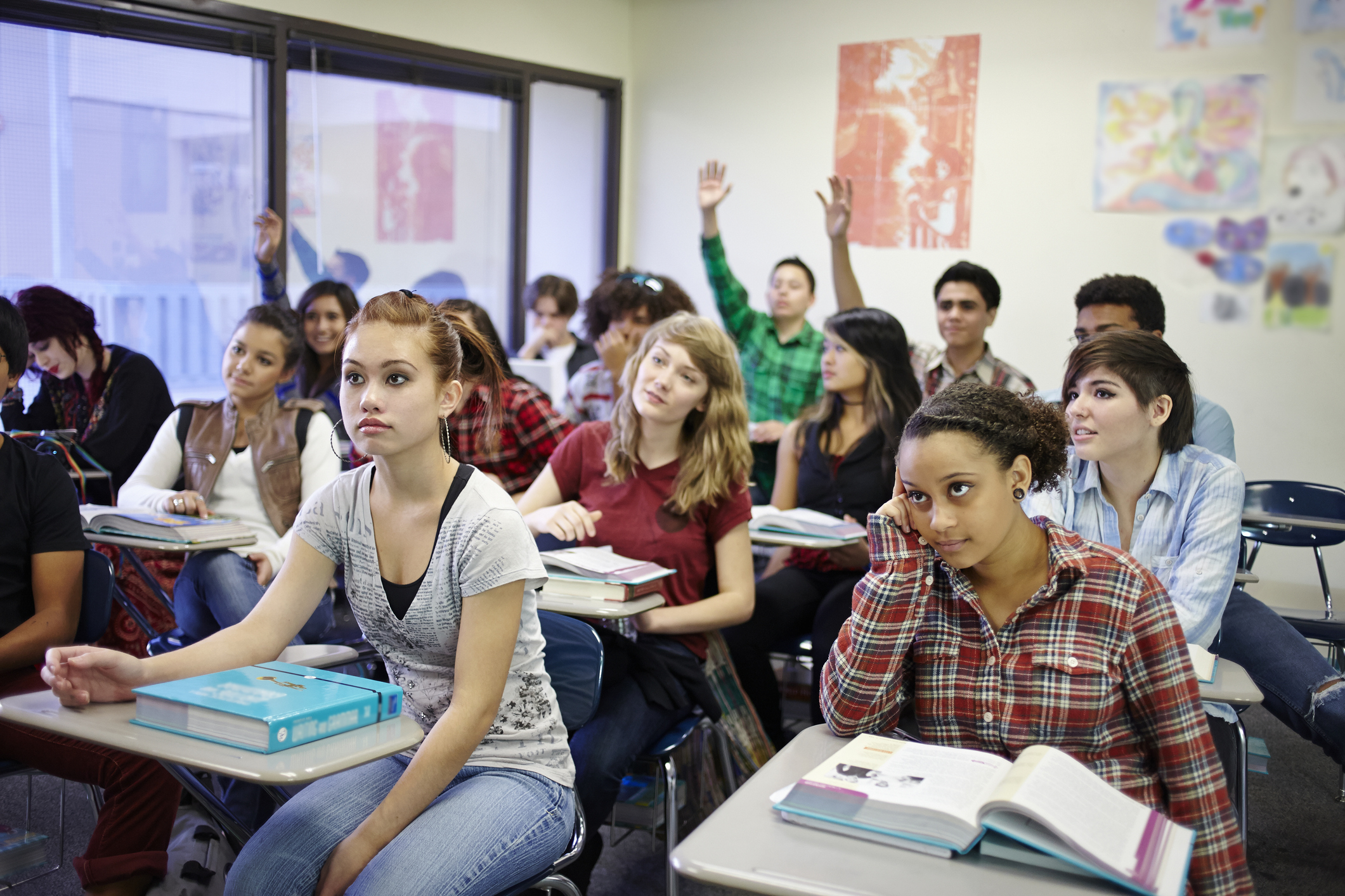 A diverse group of students in a classroom setting
