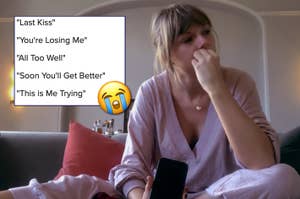 Woman sitting on couch, looking emotional with song titles on a screen and a crying emoji
