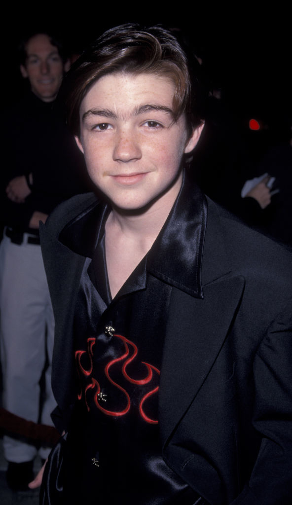 A young Drake Bell at an event