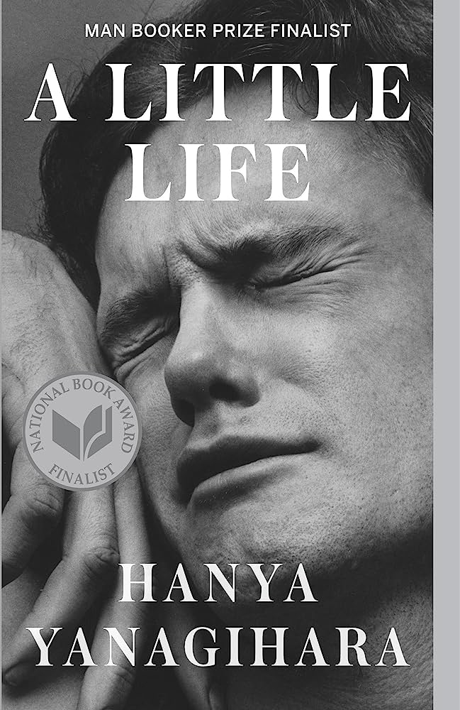 Book cover of &quot;A Little Life&quot; by Hanya Yanagihara showing a man&#x27;s anguished face with text for awards received