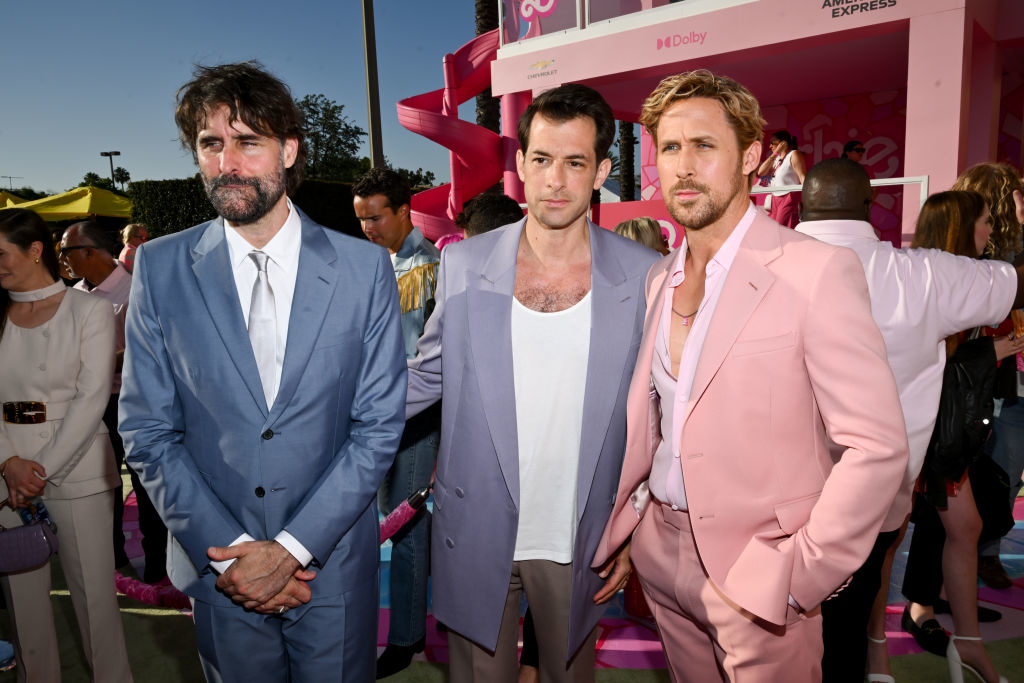 Andrew Wyatt, Mark Ronson, and Ryan Gosling on the red carpet for a Barbie media event