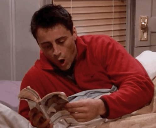 Matt LeBlanc appears surprised while reading a book