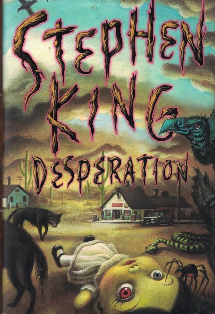 Cover of Stephen King&#x27;s &quot;Desperation&quot; featuring eerie figures and a desolate small town backdrop