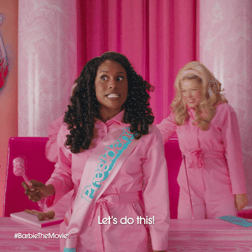 Two people in pink outfits with the text &quot;Let&#x27;s do this!&quot; from #BarbieTheMovie
