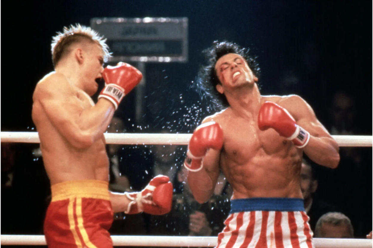 Rocky lands a punch on Ivan Drago during a boxing match