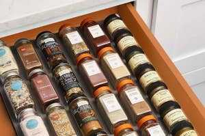 open drawer with spices organized in it