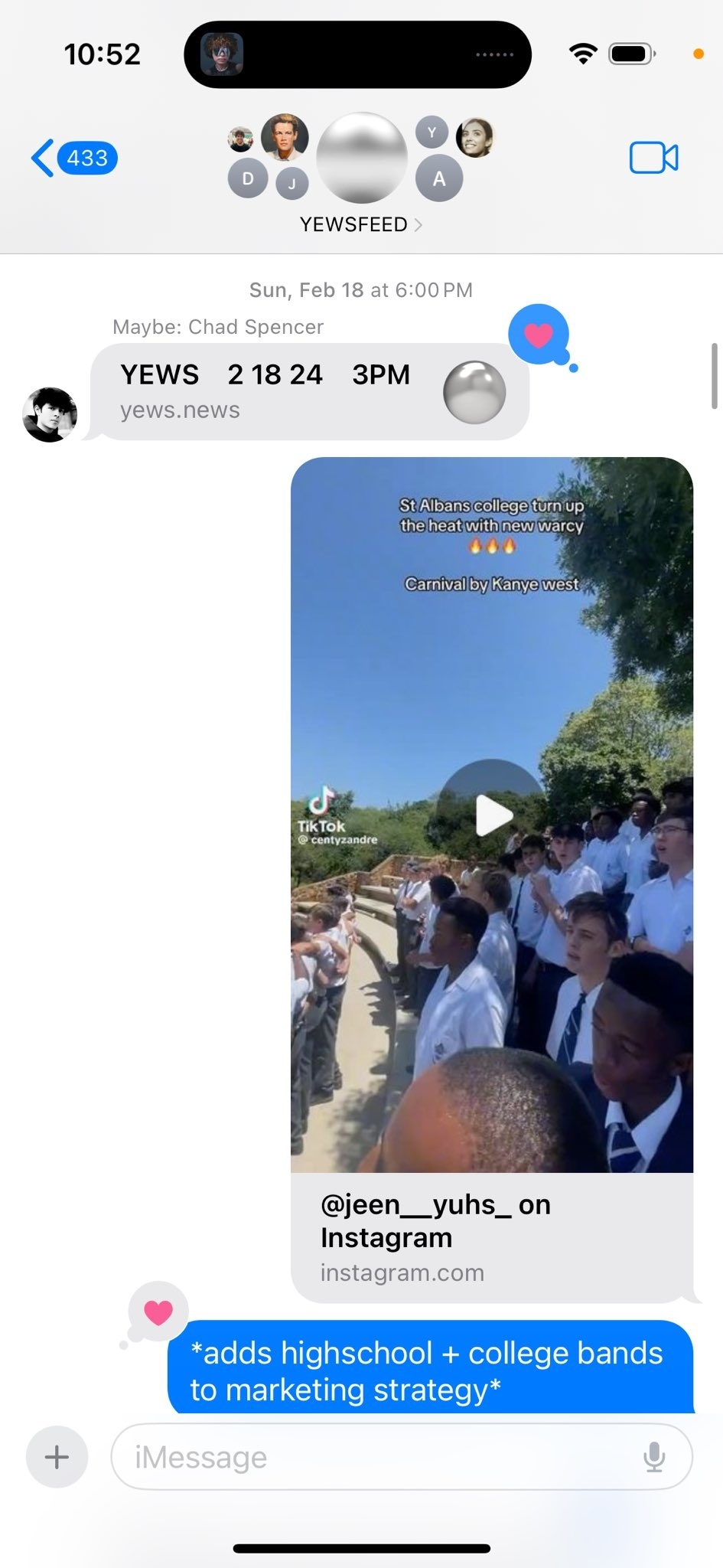 Screenshot from a smartphone displaying a social media app with a video post of a high school band lined up outdoors