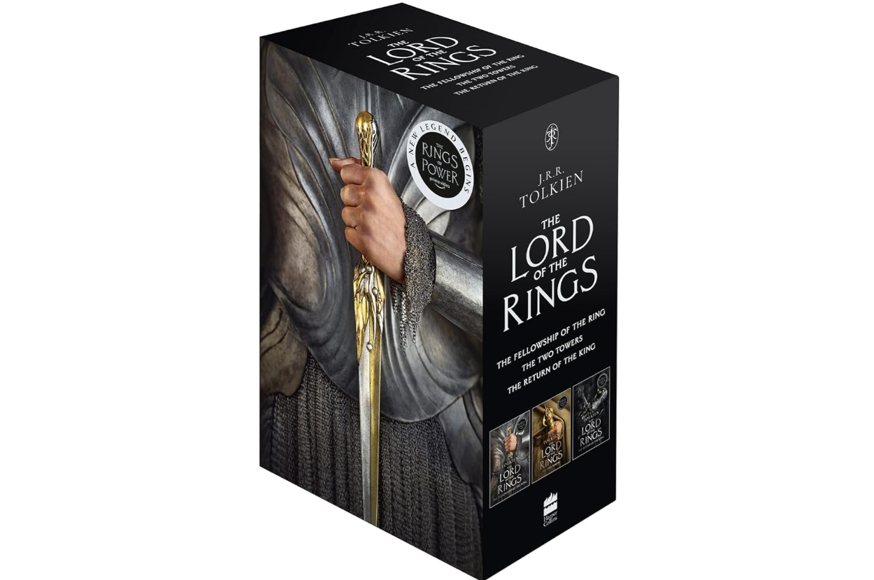 Boxed set of &#x27;The Lord of the Rings&#x27; books, featuring a close-up of a character holding a sword