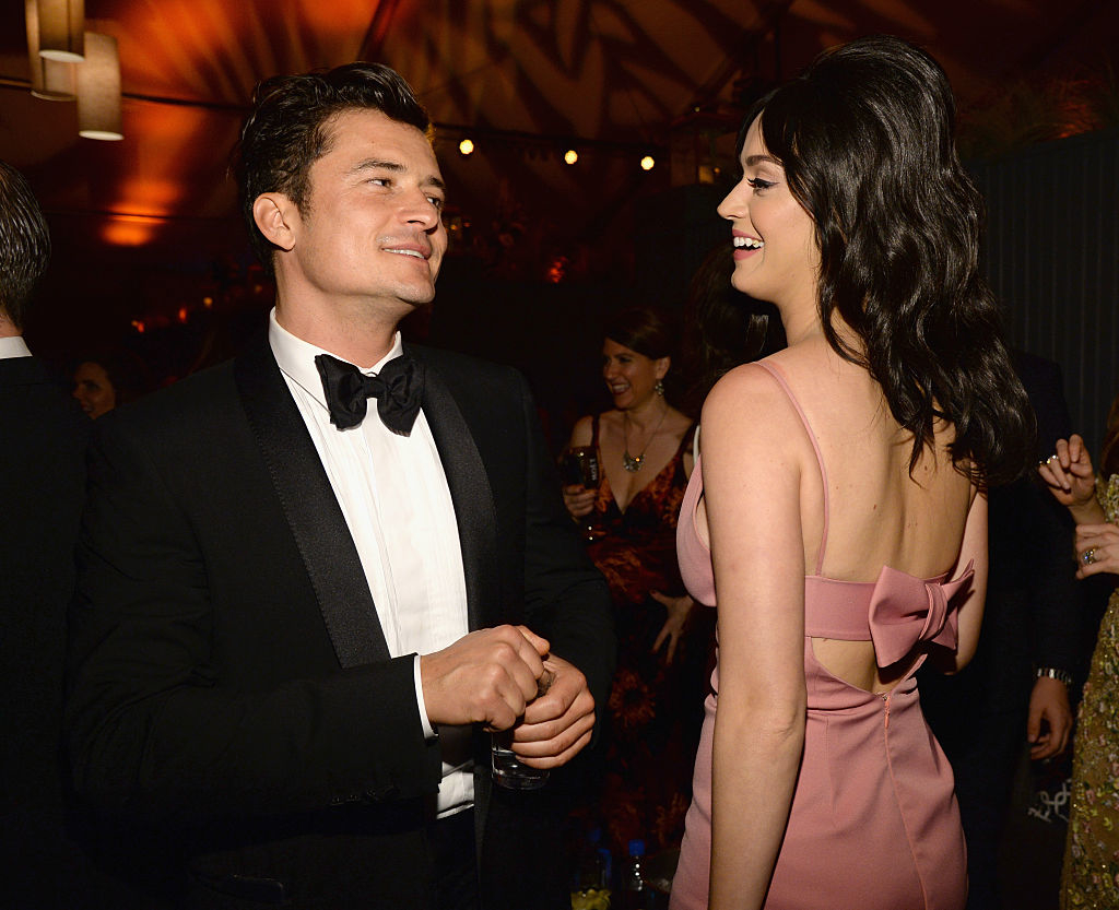 Orlando and Katy chatting at an event