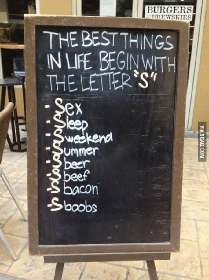 Signboard listing humorous items that begin with the letter &#x27;S&#x27;, such as sleep, beer, and bacons