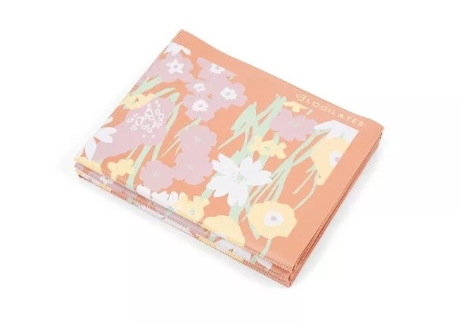 the folded yoga mat in a floral print