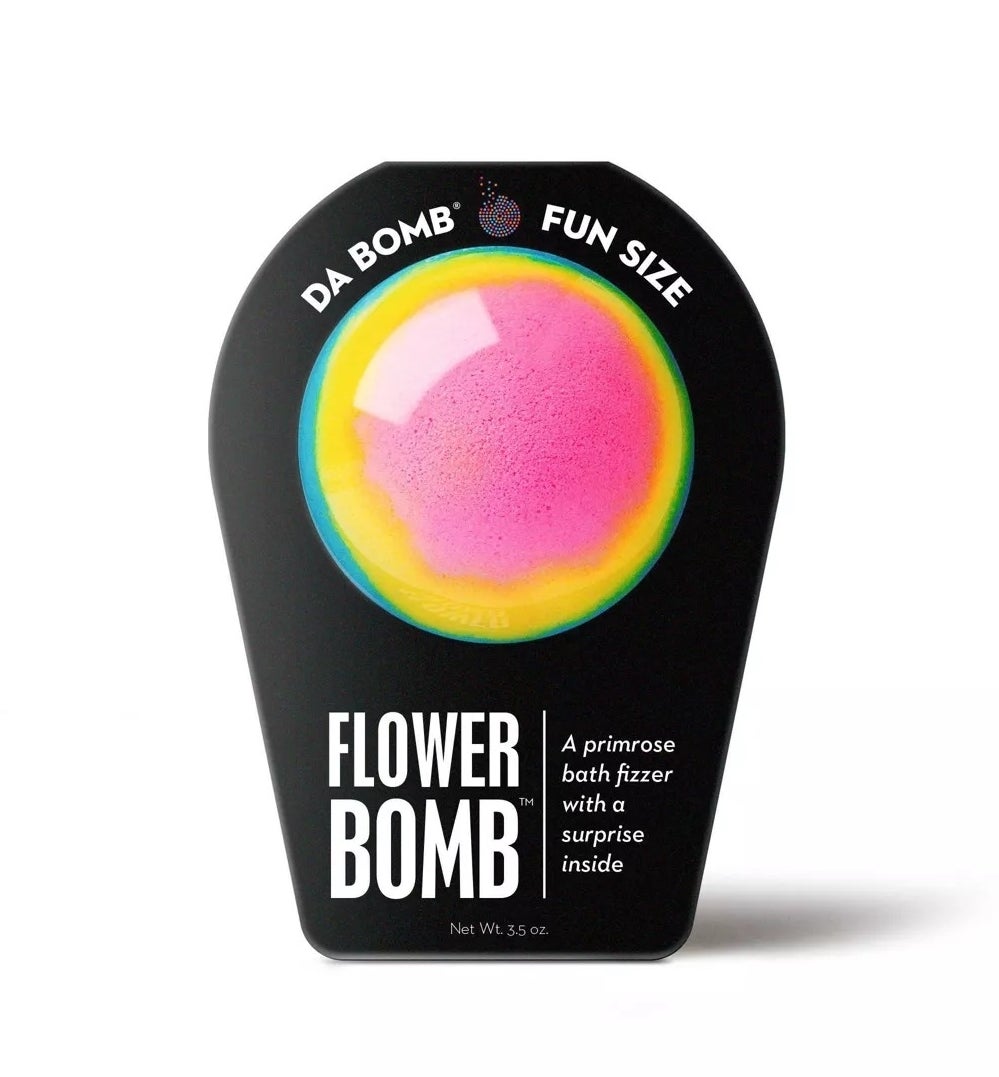 A pink, yellow, and blue spherical bath bomb