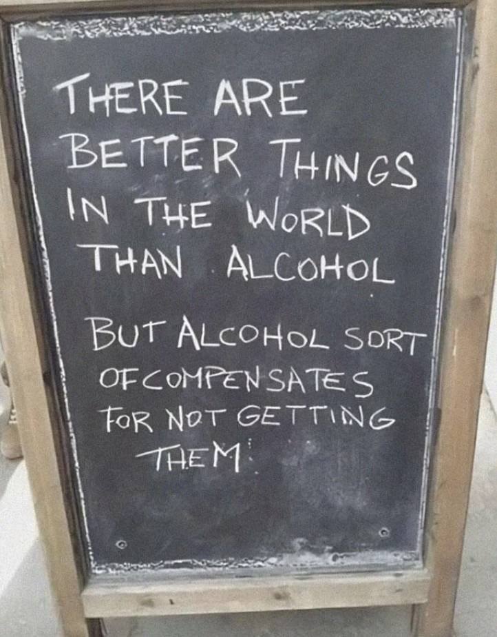 Chalkboard with a quote: &quot;There are better things in the world than alcohol, but alcohol sort of compensates for not getting them.&quot;