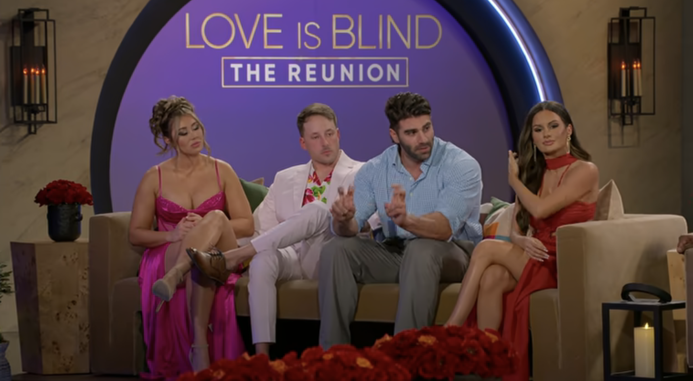 Sarah Ann, Jeramy, Trevor, and Jessica on a &#x27;Love is Blind, the Reunion&#x27; set with flowers, speaking into microphones