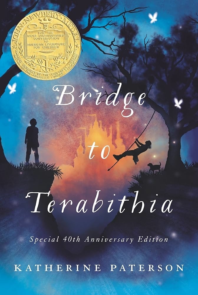 Cover of &quot;Bridge to Terabithia&quot; book, 40th Anniversary Edition, with silhouette of a child swinging from a tree