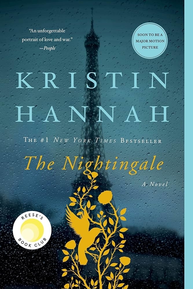 Cover of &quot;The Nightingale&quot; by Kristin Hannah, featuring Eiffel Tower silhouette and floral designs, noting its upcoming film adaptation