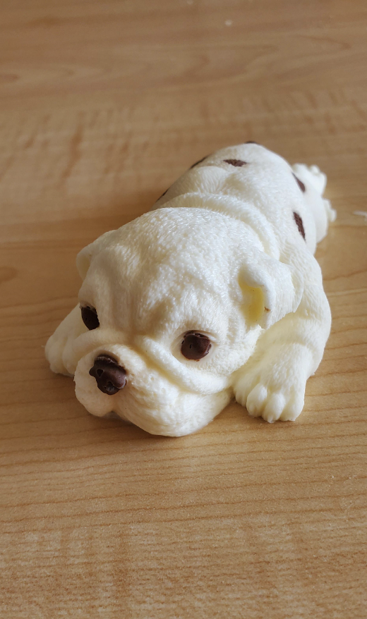 a cake in the shape of a dog