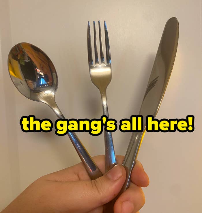 author holding fork, spoon, and knife with caption that says, &quot;the gang&#x27;s all here!&quot;