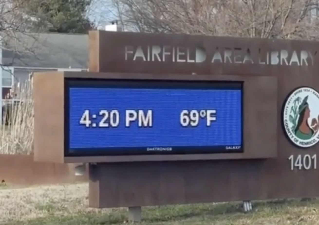 Digital sign outside Fairfield Area Library displaying time as 4:20 PM and temperature as 69°F