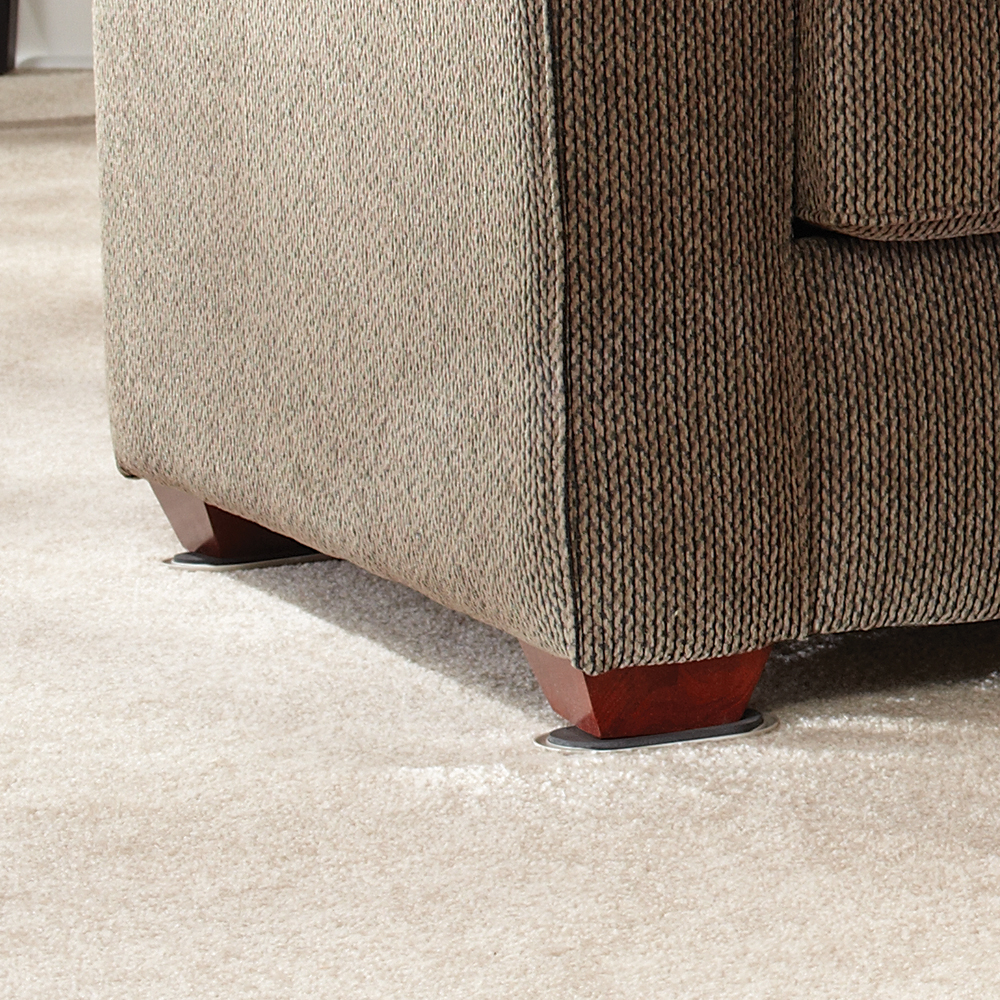 Close-up of a couch&#x27;s foot showing a furniture coaster below it, used to protect floor surfaces