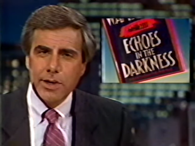 Man in a suit presenting a news segment with a graphic for &quot;Echoes in the Darkness.&quot;