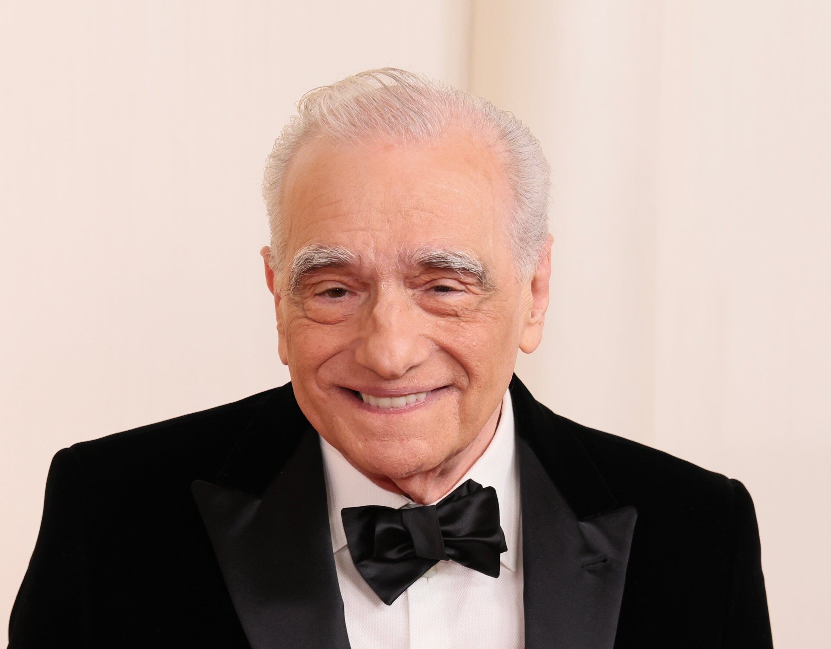 Martin Scorsese smiling in a bow tie