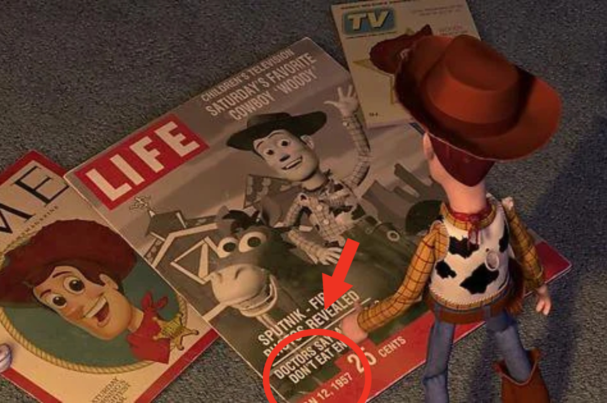 Toy Story&#x27;s Sheriff Woody standing next to vintage-style magazines on the floor