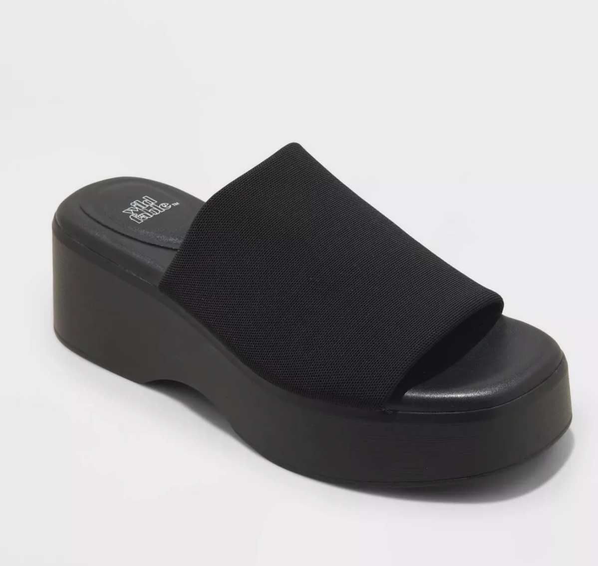 Black platform sandal with a single wide strap